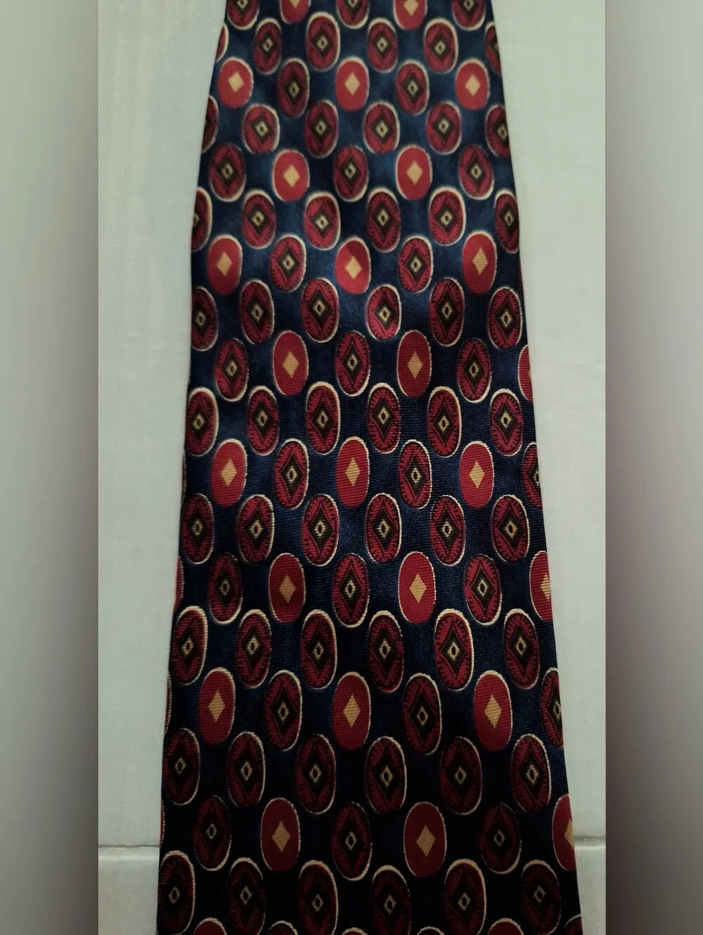 Men's Navy Tie with Red and Gold Medallion Pattern
